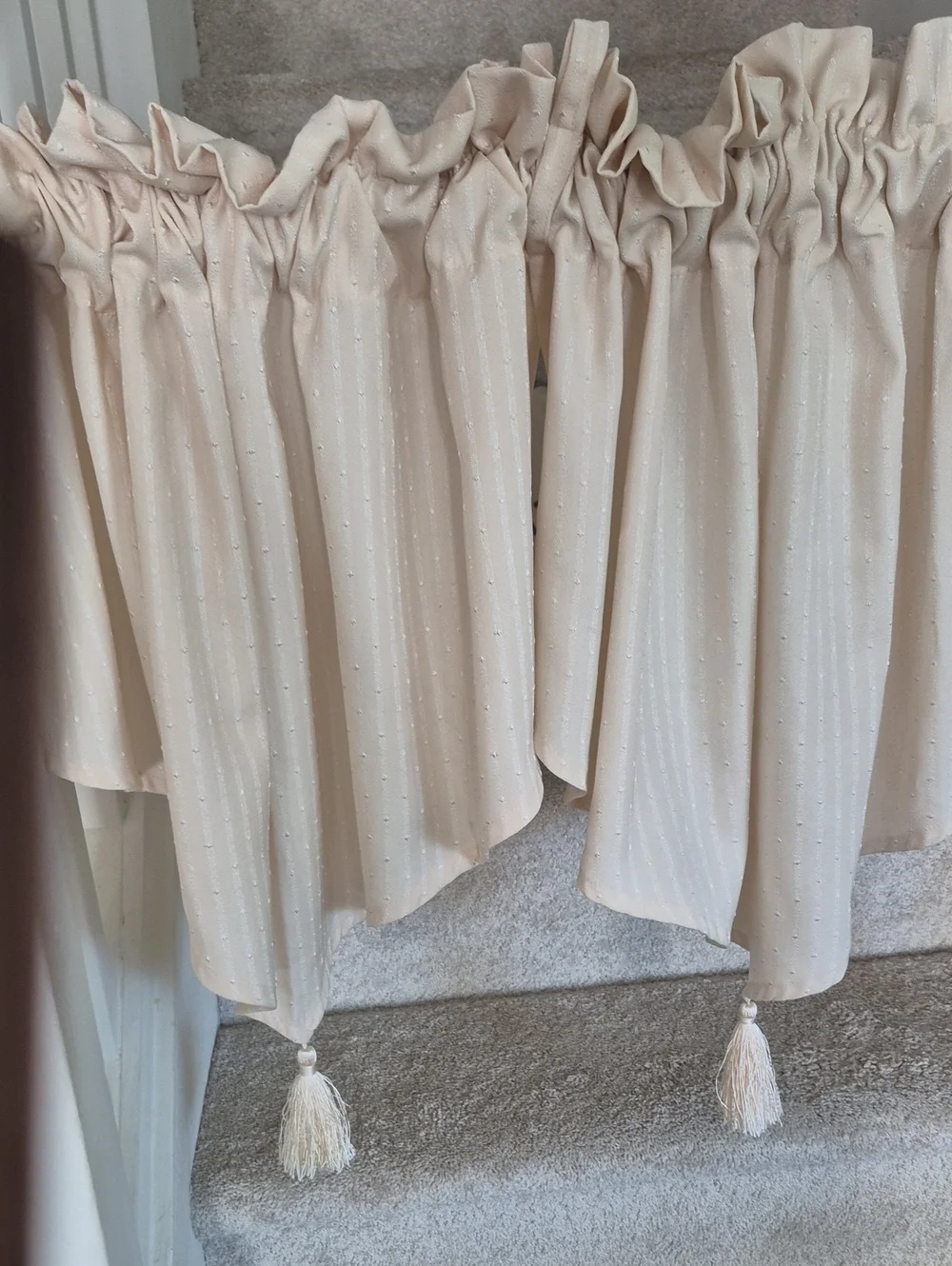 Three Cream Tasseled Curtain Panels